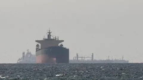 Trump hints Iran talks could resume this week as US port blockade continues