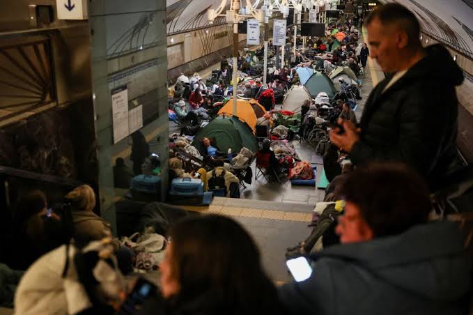 Kyiv hit by large wave of Russian strikes, people feared trapped in apartment building rubble