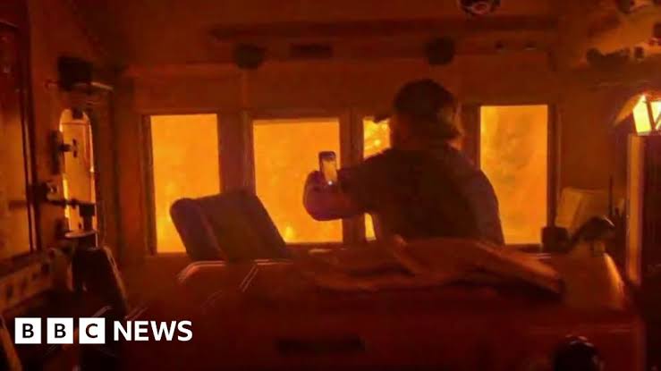 Canada wildfires leaves train 'encased in flames' as smoke from drifts towards US
