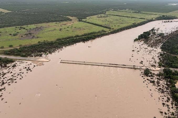 Central Texas bridge collapses as raging floods tear through region