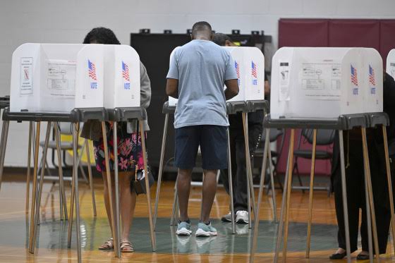 Federal judge bars Trump’s proof-of-citizenship requirement for voting