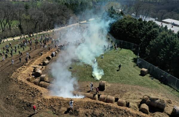 Hundreds trying to storm Wisconsin beagle research facility met with rubber bullets, pepper spray