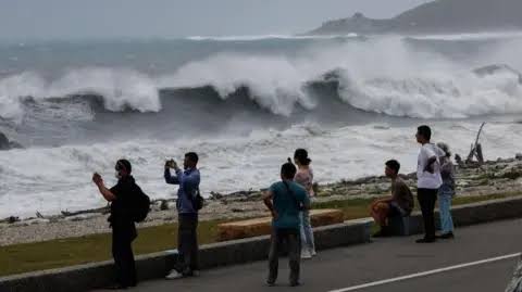 Taiwan, Japan and south-eastern China brace for Typhoon Bavi as landslides kill 15 in Philippines