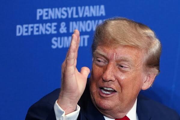 Trump drifts into campaign topics while addressing defense technology gathering