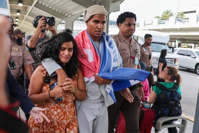 Cuban artist and dissident exiled from country after 5 years in prison arrives in US