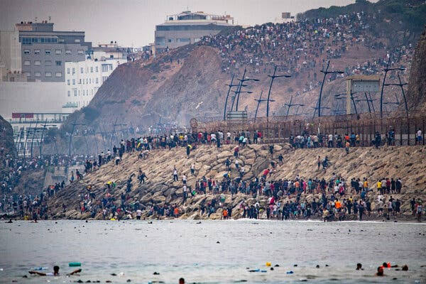 Thousands of Migrants Surge Into Ceuta from Morocco, Prompting Political Backlash