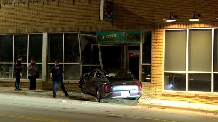 Car crashes into Omaha business, sends one to hospital