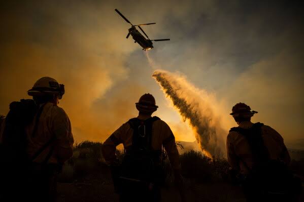 Rapidly growing wildfire in Los Angeles County prompts evacuations in remote high desert