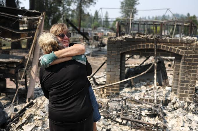 Spokane residents return to burned areas to take toll of losses