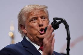 Trump goes after critics who want a more comprehensive deal with Iran