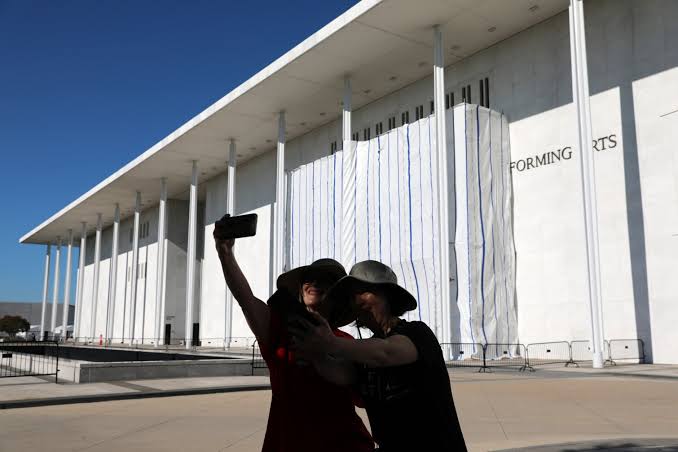 PHOTOS: What’s under the tarp? Kennedy Center facade covered after Trump’s name removed
