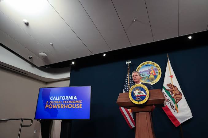 California's flush with cash. Newsom wants to cut spending anyway. Here's why.