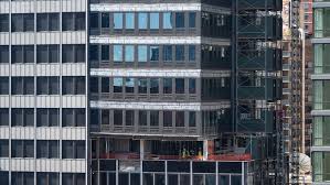 Life returns to streets around damaged NYC high-rise