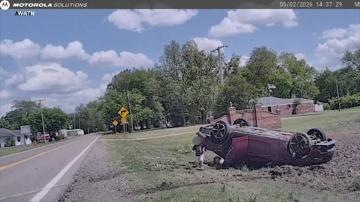 Small child climbs out of flipped car after police chase in Arkansas | Video