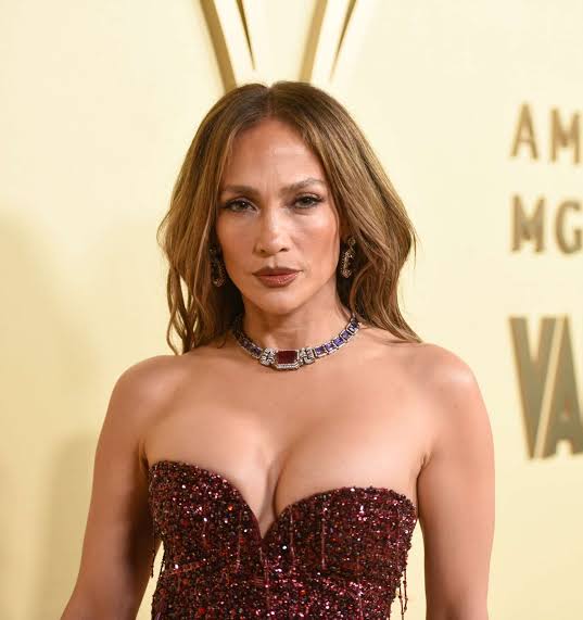 Jennifer Lopez Beats the Summer Heat in a Delicate Crêpe Dress and a Strikingly Large Sunhat at Wimbledon