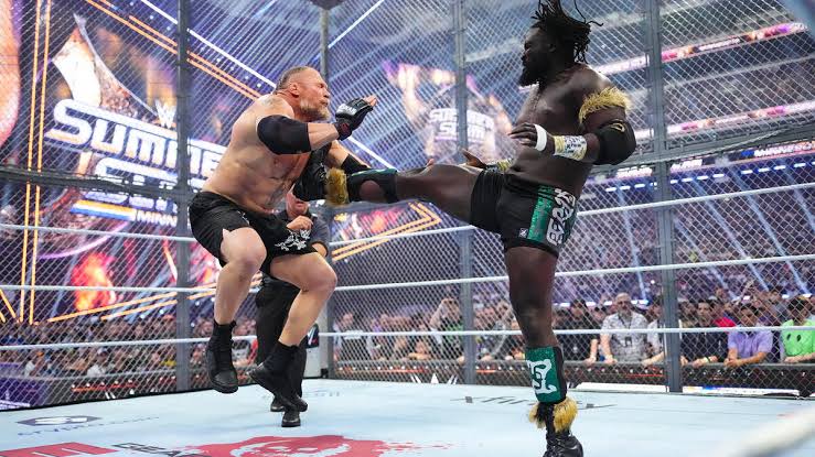 Photos: Femi and Lesnar try to destroy each other inside Hell in a Cell