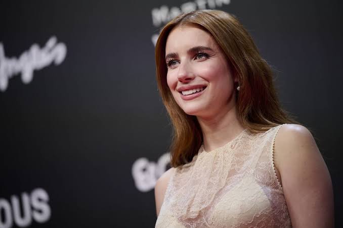 Emma Roberts Puts a Disco Spin on Bridal Dressing in Semi-Sheer White Tulle Gown for Wedding After-Party