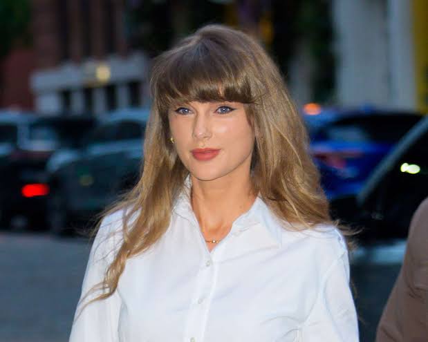 Taylor Swift Ushers in Summer in a Sleeveless Floral Dress While Making Major Career Announcement