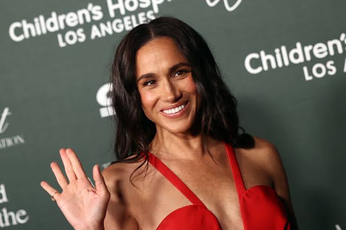 Meghan Markle Dives Into Pool in a Black One-Piece Swimsuit to Celebrate Her 45th Birthday
