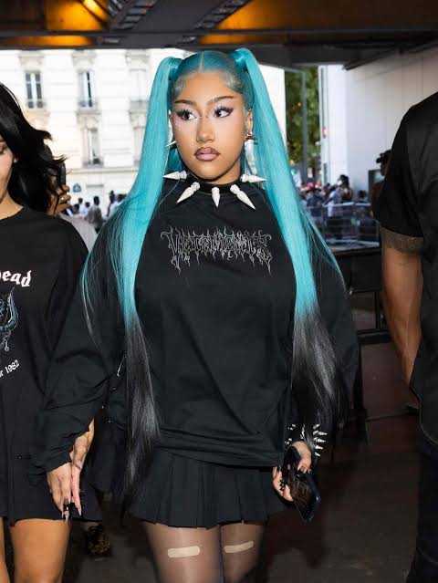 North West, 13, Debuts Bold Lip Piercings With a Spiked Collar and XXL Pigtails at Paris Fashion Week