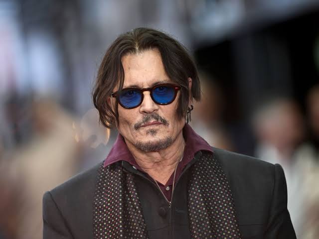 Johnny Depp Looks Unrecognizable With Long Curly Gray Hair and Mutton Chops