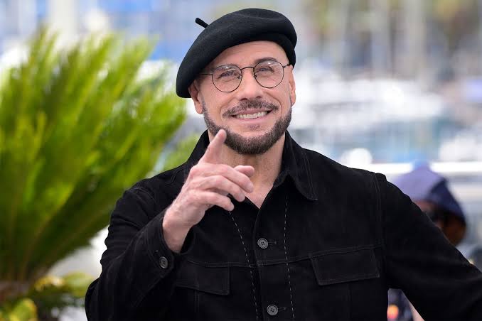 John Travolta addresses viral new look debuted at Cannes: 'I'm going to play the part'