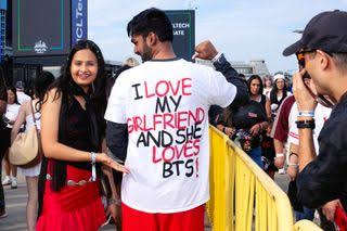 ‘He Comes to Every Concert With Me’: Meeting the BTS ARMY Boyfriends Outside the Arirang Tour
