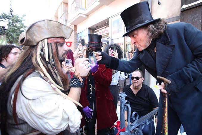 Johnny Depp Is Unrecognizable as Ebenezer Scrooge in Surprise San Diego Comic Con Appearance