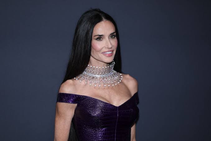 Demi Moore Pairs an Electric Purple Reptile Gown With the Boldest 101-Carat Diamond Collar at Cannes