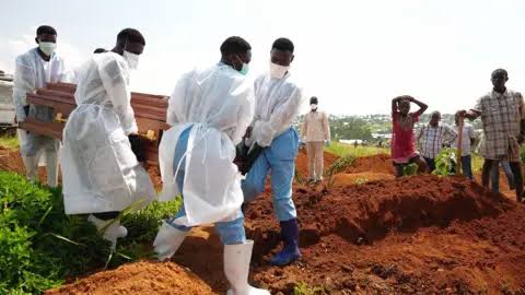 'I buried my parents one day after the other' - Ebola mourners learn how to grieve safely