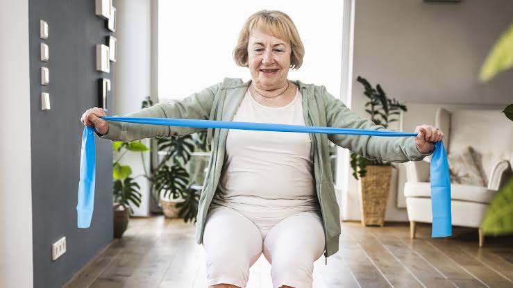 This four-move resistance band workout for seniors will improve mobility and build functional strength