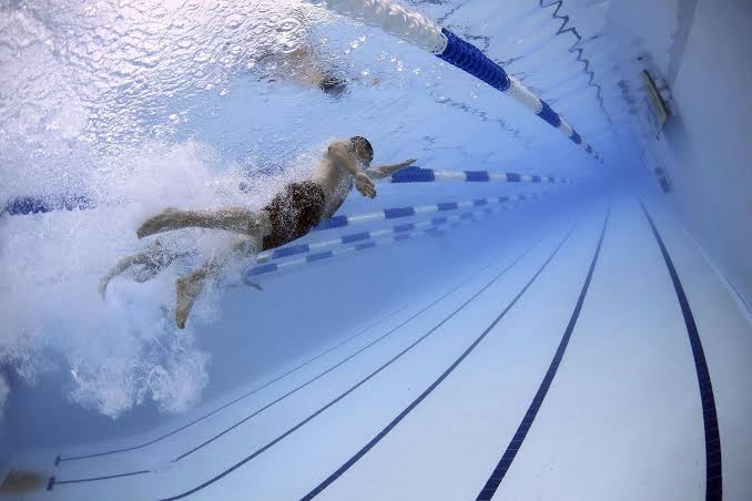 Workout habits may protect against inherited heart problems, findings suggest