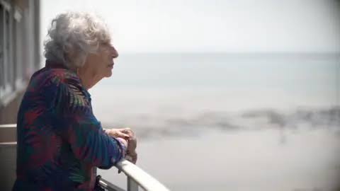 Woman from Essex urges over-70s to self-refer for mammograms