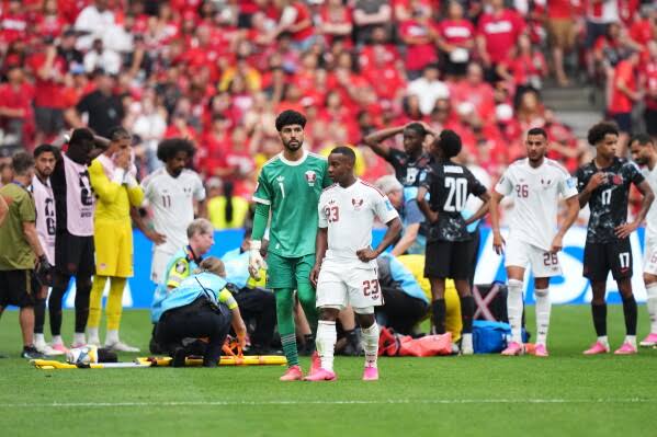 Qatar's Assim Madibo banned for 5 games after breaking the leg of Canada's Ismaël Koné at World Cup