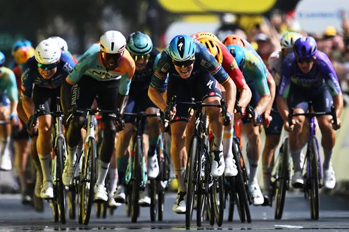 Belgian rider Tim Merlier wins Stage 7 of Tour de France as race favorite Tadej Pogačar keeps yellow jersey