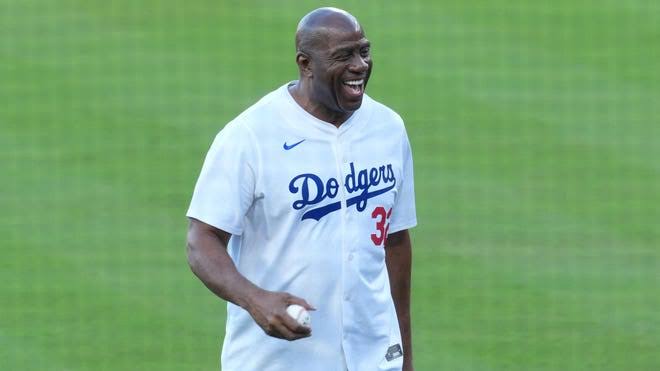 Magic Johnson skips Dodgers' visit to White House. What does it mean?