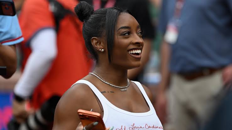 Simone Biles Shares Health Update in Photo, 'Almost Dying Wasn't On My Bingo Card'