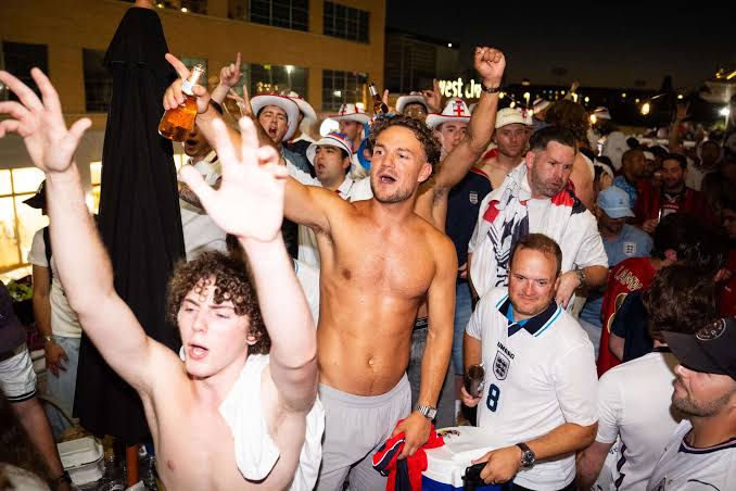 Please enjoy photos of plastered England fans drinking a Dallas bar dry