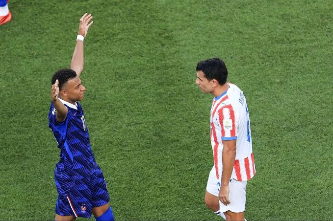 Victorious Mbappe levels Messi in World Cup golden boot race, did Paraguay’s tactics go too far? - The Athletic