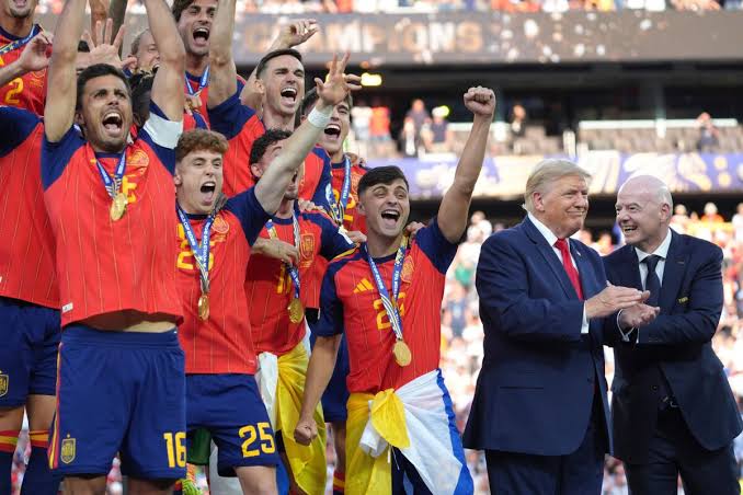 Trump lingers awkwardly long after presenting World Cup trophy to Spain. It could have been worse