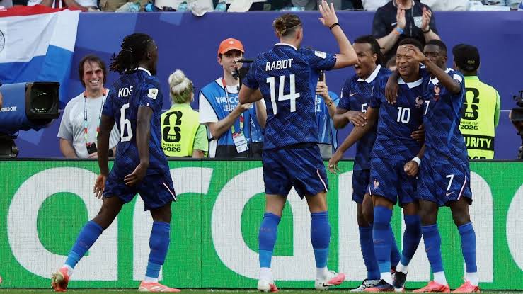 France pass toughest World Cup test yet in beating feisty Paraguay