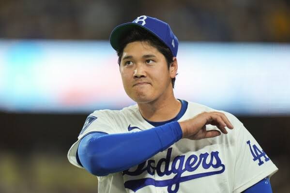Shohei Ohtani pitches but doesn't bat for first time since 2021. He's still sore from a hit-by-pitch