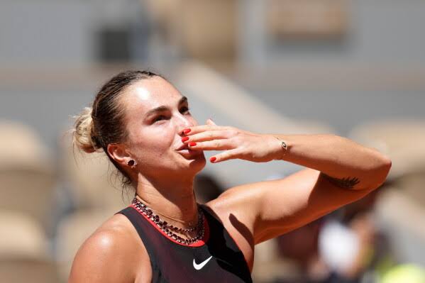 Sabalenka's necklaces sparkle in the sun during French Open win. Gauff, Osaka, Sinner advance