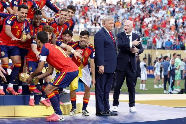 Spain rejoices in World Cup victory, even if some fans say Trump lingered too long in team's photo-op