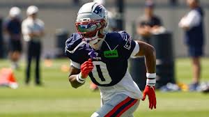 Patriots' Christian Gonzalez reports to mandatory minicamp