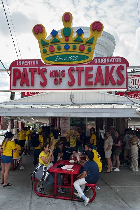 World Cup visitors marvel at American food, from cheesesteaks to cheese slices