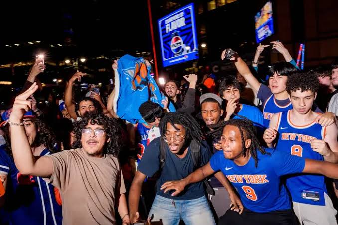 Fans are jubilant and mostly orderly after Knicks prevail in NBA Finals opener