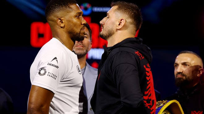 Anthony Joshua survives early scare to win by KO: Highlights, results