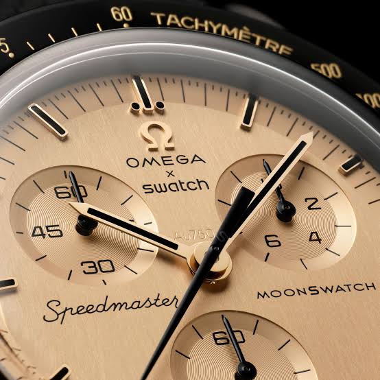 Swatch’s New Gold MoonSwatch Solves the Problem of the Nightmare Royal Pop Launch