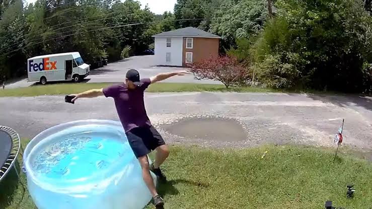 FedEx Delivery Driver Falling Into a Front Yard Pool Outside a Georgia Home Shows What Seconds of Screen Distraction Can Do